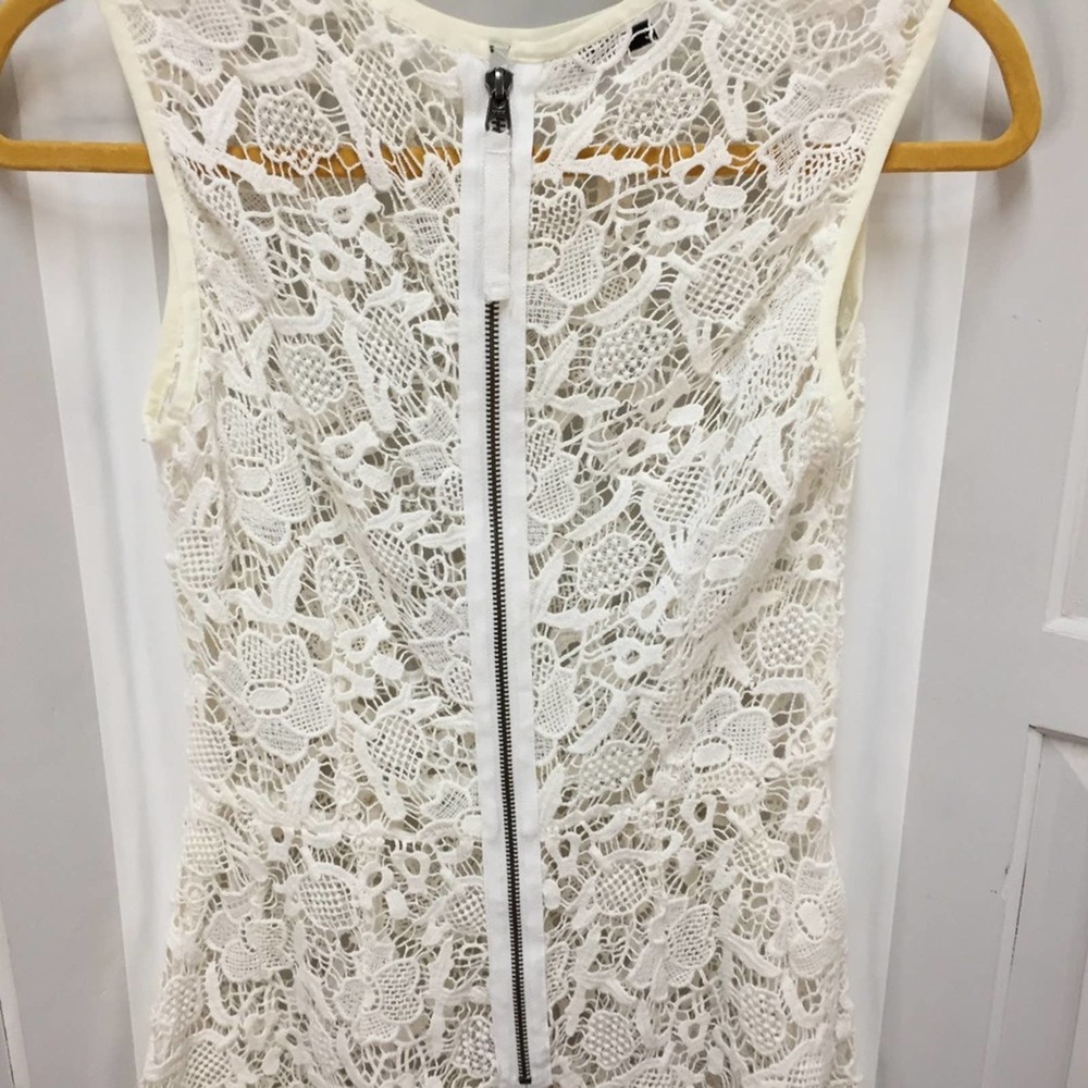 CAbi White Crocheted Lace Sheer Peplum Top - Picture 13 of 16